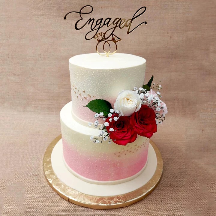 Elegant Birthday Cake with a Single Red Rose